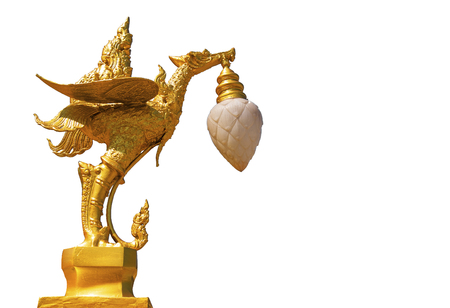 Isolate Thailand golden swan lamp on the top of electricity post on white background for decoration.Copy space concept.の写真素材