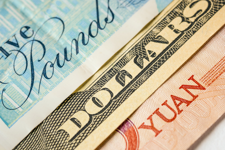 Close up of variety major banknote in the world for example pound sterling US dollar and Yuan....