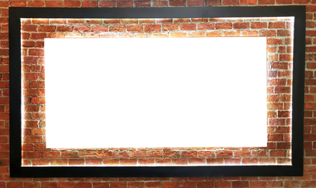 Empty white board on orange brick wall background.  - Imageの写真素材