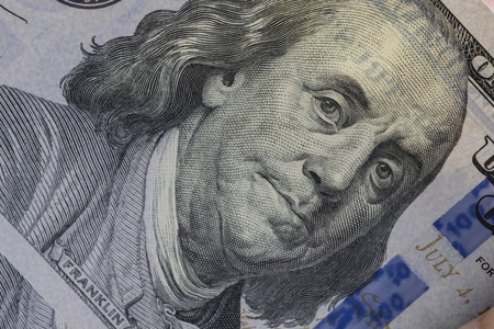 Closeup Benjamin Franklin face on one hundred US dollar banknote.-Image.の写真素材
