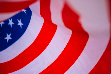 Wavy of United Stated of America flag with white background.-Image.