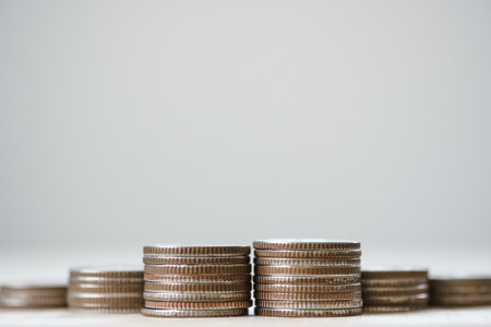 Closeup growing coins stacking . Saving  investment and profit concept.-Image.