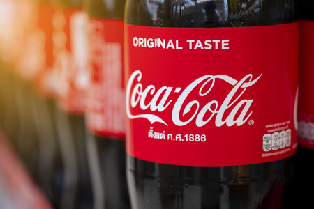 BANGKOK, THAILAND - MAY 23, 2019: Coca-Cola logo printed on plastic bottle and placed on shopping...