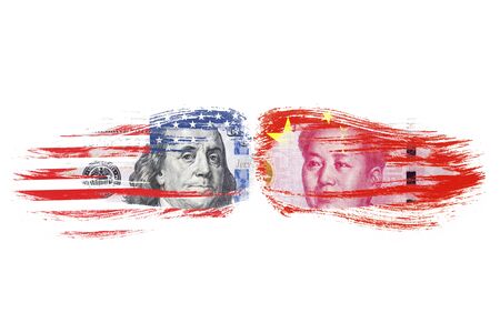 US dollar and Yuan banknote on USA and China flags. Its is symbol of economic tariff trade war crisis between United States of America and China which the biggest economic country in the world.の写真素材