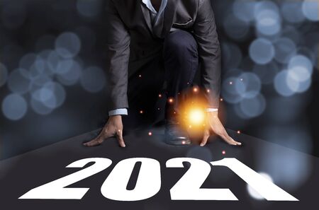 Businessman get beginning point area for start 2021 new year. Leader and manager create new target...
