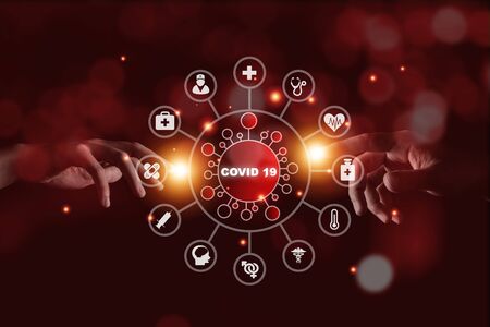 Two Hand touching to CORONA Virus and health medical icon.Now COVID 19 already epidemic around the world and many people dies.の写真素材
