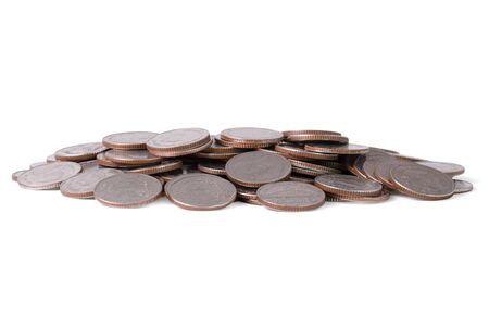 Isolated heap of coins on white background. Saving for business investment with clipping path.の写真素材