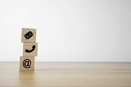 Sign of e-mail , address and telephone print screen on wooden block cube for business marketing...
