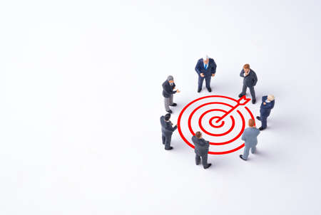 Concentrate setup objectives target and business goal ,Manager miniature figures standing and see in...