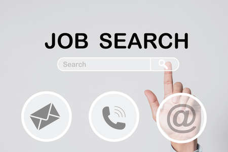 Hand touching and look for online new job search from head hunters website ,Recruitment concept.の写真素材