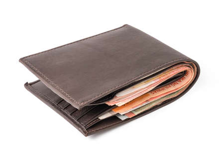 Isolated of brown leather wallet with money banknotes on white background.