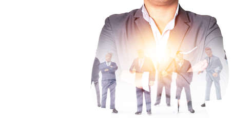 Business team work concept, Double exposure of Businessman and small figure on white background.の写真素材