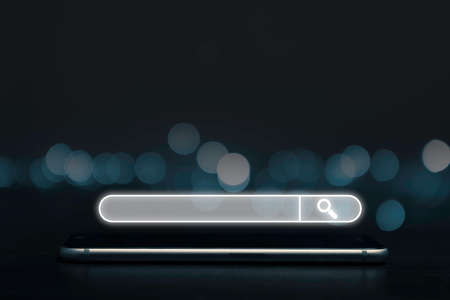 Search Engine Optimisation or SEO concept , Searching box and icon on smartphone.