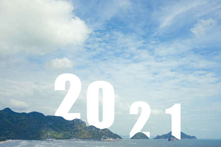 White of number 2021 on sea with sunrise and morning sky.Welcome merry Christmas and happy new year...
