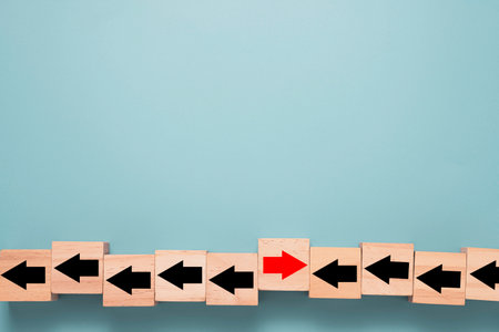 Business disruption and different thinking idea concept ,Wooden cube block which print screen red...