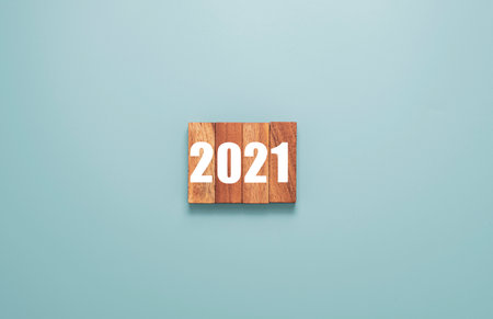 2021year Printed on Wooden cubes block. Merry Christmas and happy new year concept.の写真素材