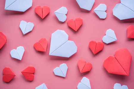 Valentineâ€™s Day concept, Red and white heart on pink background.