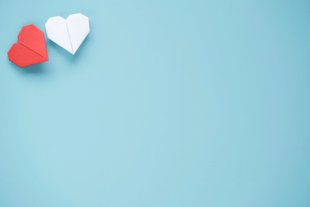 Valentineâs Day concept, Red and white heart on blue background.の写真素材