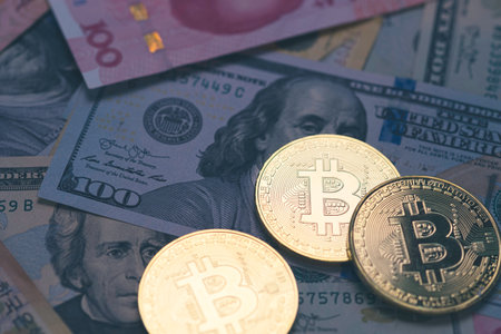 Golden Bitcoins pile on banknote background. Digital and actual currency exchange concept.