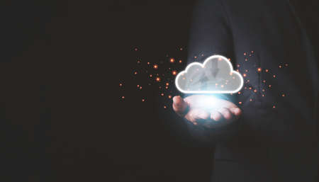 Hand holding to virtual artificial intelligence with cloud computing technology transformation and...