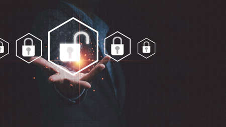 Businessman holding Unlock master key with lock key for access technology security information...