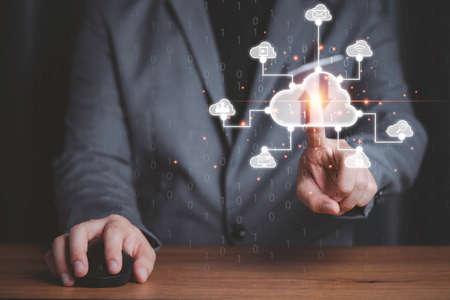 Businessman touching virtual cloud computing with connect to technology icons