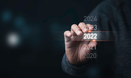 Businessman holding infographic  2022 year,Preparation Merry Christmas and happy new year concept.