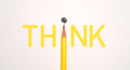 Yellow pencil arrange on centre of think wording design on white background , Creative thinking idea and innovation concept.の写真素材