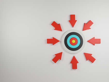 Red arrow shot towards the center of the dartboard on white background and copy space for concentrate in business target and objective concept, 3d render.の写真素材