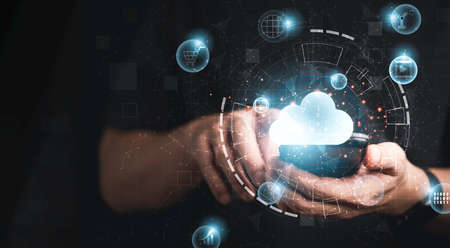 Businessman using smartphone with virtual cloud computing technology transformation and internet of...
