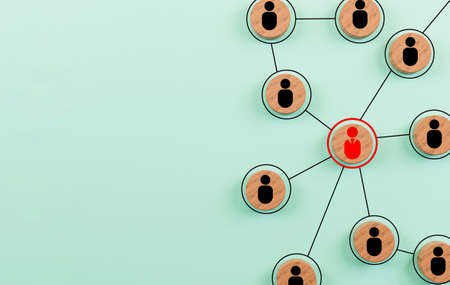 Wooden cube block print screen person icon which link connection network for organisation structure...