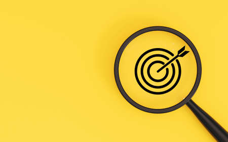 Target board inside of magnifier glass on yellow background and copy space for focus business objective achievement concept by 3d rendering.の写真素材