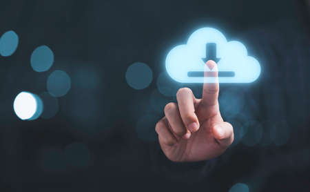 Hand touching cloud computing with download sign symbol for technology transformation and sharing concept.の写真素材