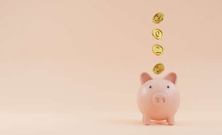 2022 year on golden coin falling to pink piggy saving bank on pink background and copy space for new year banking saving concept by 3d render.の写真素材