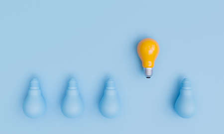 Yellow lightbulb up direction which different with blue lamp for different creative thinking idea concept by 3d render.の写真素材
