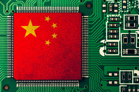 China flag print screen on electronic circuit board for symbol of China is World manufacturing concept.の写真素材