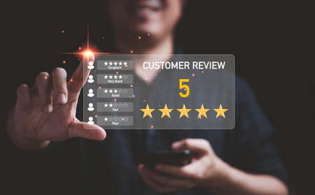 Businessman touching virtual monitor screen for client excellent evaluate score after customer use...