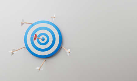 Target board with arrow on the blue background and copy space for challenge setup Business achievement goal and objective target concept by 3d render.の写真素材