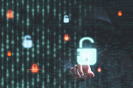 Man in dark hoodie touching to master key to unlock on binary code background for hacker in computer...