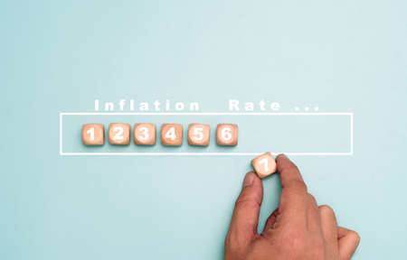 Hand array increasing number update inflation rate for economic recession crisis after covid-19 pandemic and goods price higher concept.の写真素材