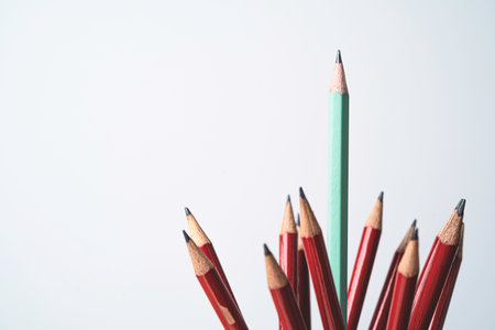 Blue pencil move out of red pencils for outstanding leadership and different thinking of idea concept.の写真素材