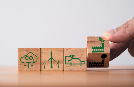 CO2 reducing ,Green factory and electric vehicle icon for decrease CO2 , carbon footprint and carbon credit to limit global warming from climate change, Bio Circular Green Economy concept.の写真素材