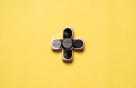 Black plus sign on yellow background for positive thinking mindset of personal development benefit and health insurance concept by 3d rendering.の写真素材