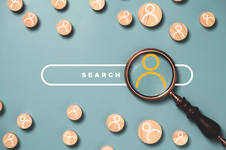 Top view of magnifier glass with search bar and human icon for approve person from job application. Human Resources HR management Recruitment from employment headhunting Concept.の素材 [FY310194892299]