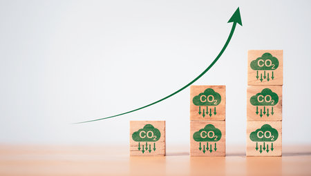 Stacking CO2 reducing icon with up arrow for decrease CO2 , carbon footprint and carbon credit to limit global warming from climate change, Bio Circular Green Economy concept.の写真素材