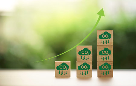 Stacking CO2 reducing icon with up arrow for decrease CO2 , carbon footprint and carbon credit to limit global warming from climate change, Bio Circular Green Economy concept.の写真素材