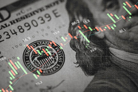 Closeup Benjamin Franklin face on USD banknote with stock market chart graph for currency exchange...