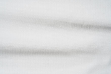 Closeup elegant crumpled of white silk fabric cloth background and texture. Luxury background design.の写真素材
