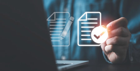 Businessman using electronic pen sign tick mark on virtual document for online approve paperless quality assurance and ERP management , Prepare check and approve concept.の写真素材