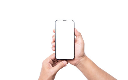 Isolate of Hand holding  blank screen of smartphone on white background with clipping path for mockup advertisement and social icon.の写真素材